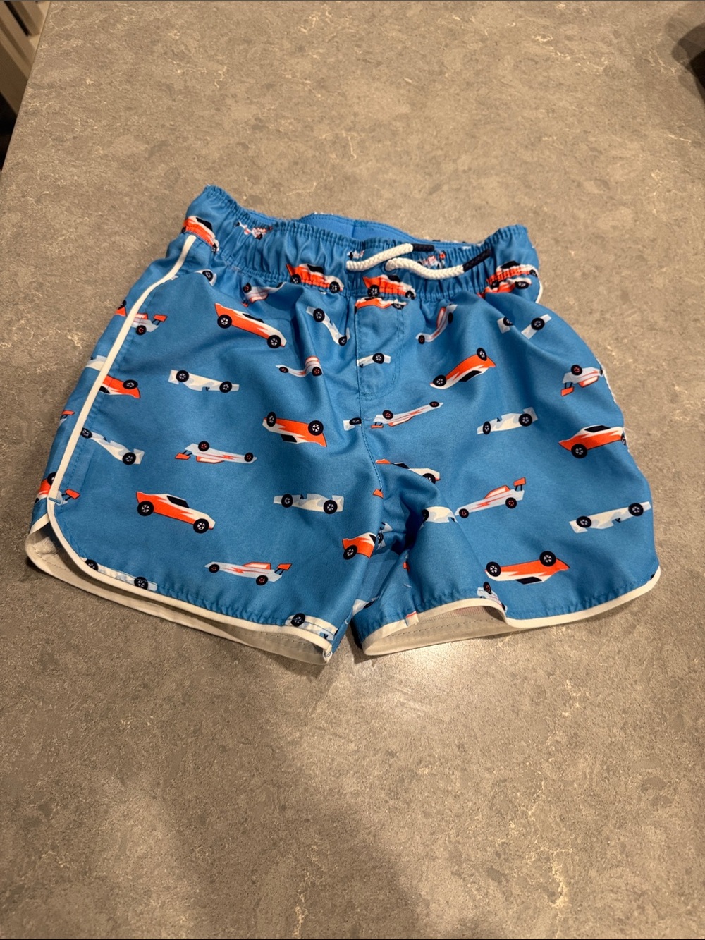 Cat & Jack Blue Boys Swim Trunks with Orange and White Race Cars